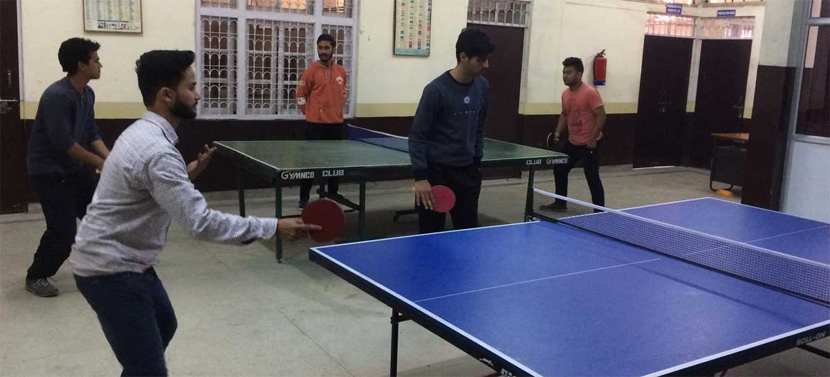 Students playing table tennis